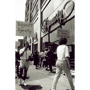 Demonstrators picket outside Dynasty Restaurant demanding back wages for workers