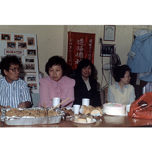 Guests eating at an International Women's Day event