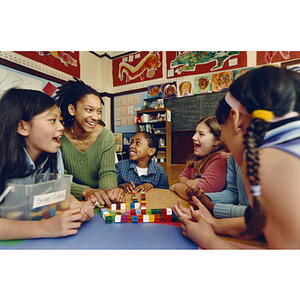 School of Education student playing with elementary school children