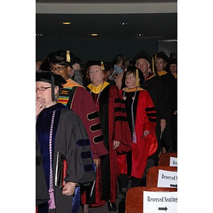 Faculty members proceed into School of Nursing convocation