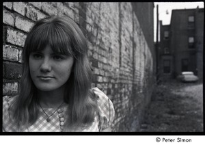 Karen Helberg, posed by a brick wall in York, Pa.