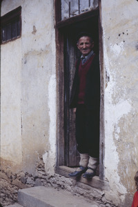 Old man in doorway