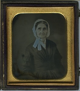 Abigail Barrows Dickinson: half-length studio portrait of older woman wearing a bonnet