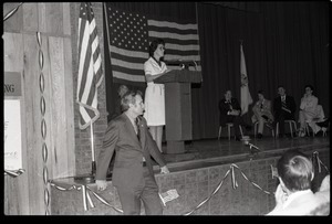 Ellen McCormack, speaking at a campaign rally while running for President: view of security and stage