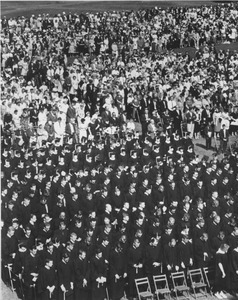 Audience and graduates during the Centennial commencement