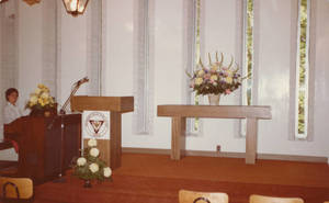 Playing the organ at the dedication of Loveland Chapel, 1981