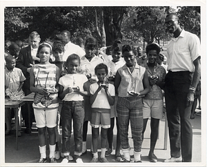 Thomas "Satch" Sanders of the Boston Celtics with unidentified girls