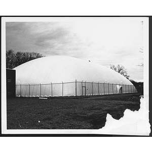 Large covered and fenced in building