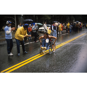 Para-athlete in wheelchair competing in Boston Athletic Association (BAA) marathon