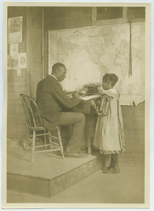 Black teacher and student in West Virginia school