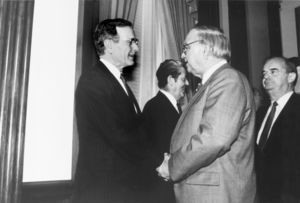 John Joseph Moakley shaking hands with President George Bush