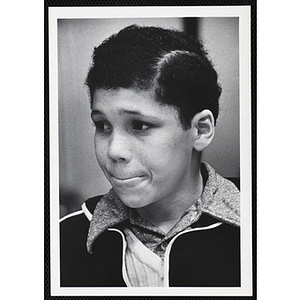 A boy from the Boys' Clubs of Boston looking off to his right