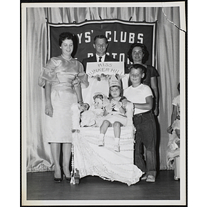 The Little Sister Contest winner posing with her brother and three judges, including Richard Harte, Jr., at center