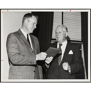 John U. Harris, Jr., at left, holding a certificate with Frederic C. Church