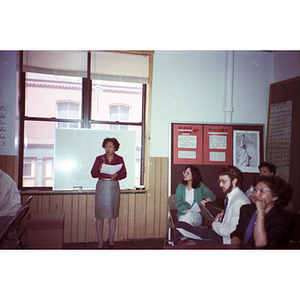 Woman makes a speech at the victory party at the Chinese Progressive Association to celebrate Dynasty Restaurant workers winning their back wages