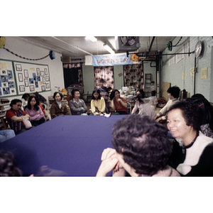 Seated guests at an International Women's Day event