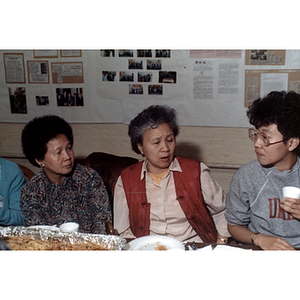 Guests talking at an International Women's Day event