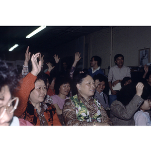 Participants at a garment workers' meeting