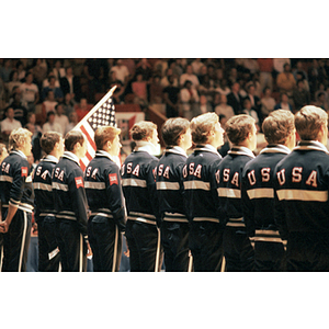 Members of the Men's USA Volleyball Team stand in a line
