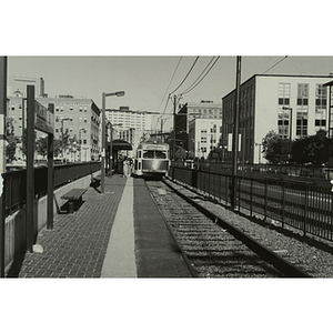 A green line outbound train at the Northeastern University stop