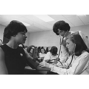 Janet Carroll instructs a nursing student