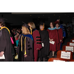 Faculty members proceed into School of Nursing convocation