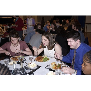 Northeastern News staff eating at the Student Activities Banquet