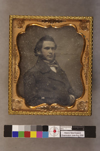 Unidentified man with heavy sideburns