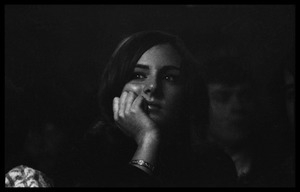 Woman in the audience at a Beatles concert, gazing dreamily