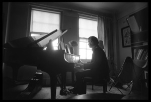 Stephen Stills playing piano in Judy Collins's New York apartment