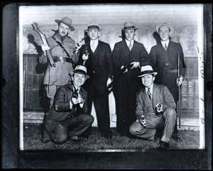 Police and detectives with guns taken from the Vincent Coll gang