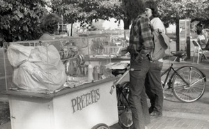 Purchasing pretzels from a street cart, possibly in Springfield