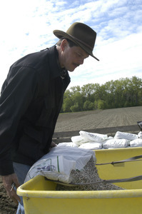 Lazy Acres Farm (Zuchowski Farm): Allan Zuchowski loading fertilizer for his corn crop