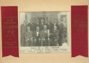 Eleven men of the class of 1876 posing on the porch of a house at their 50th reunion