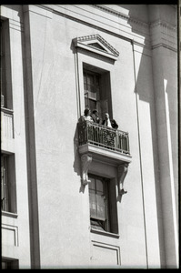 May Day demonstrations and street actions by the Justice Department: people on balcony of Justice Department building, observing