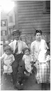 Family in the Back Central Street neighborhood. [02]