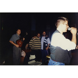 Alex Alvear (right, with the microphone), Claudio Ragazzi (left), and two unidentified Areyto musicians.