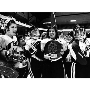 Women's hockey team celebrates win of the Eastern College Athletic Conference Division I Hockey Championships