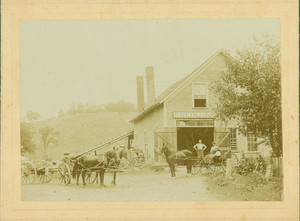 People in front of W.E. Fallon's shop, Chester, Vt., undated