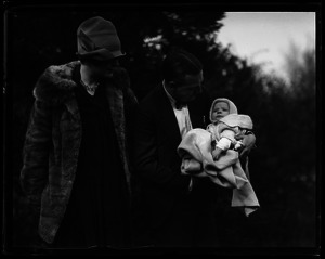 Lowell Ames Norris with his wife Helen, and infant son Curtis