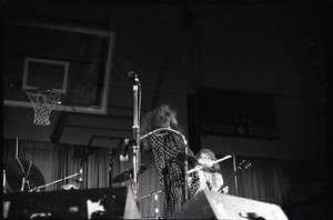 Jethro Tull in concert at the Springfield Civic Center: Ian Anderson (flute) dancing away from microphone