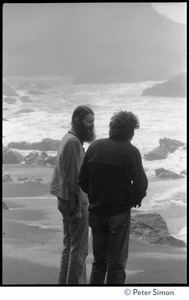 Rameshwar Das talking with an unidentified man at the beach