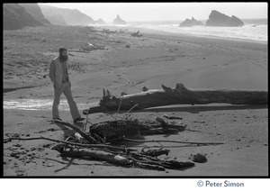 Rameshwar Das walking a beach in Sonoma County