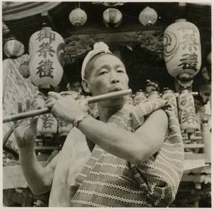 Japanese flute player at a matsuri