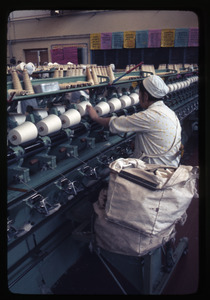 Cotton Mill No. 2: a woman at spindles, close-up