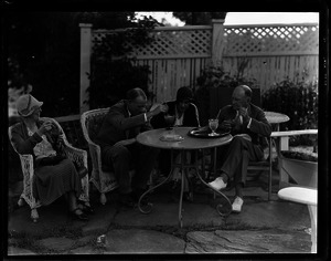 Sinclair Lewis (2nd from left) on the patio at Twin Farms