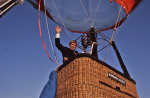 Buddy Bombard waving from gondola of the Bombard Society balloon