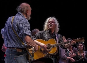 Pete Seeger (banjo) and Arlo Guthrie (guitar) performing at Symphony Space, New York City, in a concert to pay tribute to George Wein