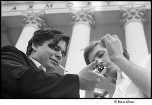 National Student Association Congress: Phillip Semas (l) lighting a cigarette for an unidentified man