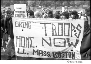 Resistance rally: demonstrators on Boston Common holding a sign reading 'bring the troops home now U. of Mass. Boston'